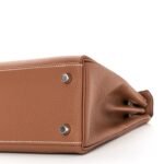 Togo Kelly Retourne 25 Gold